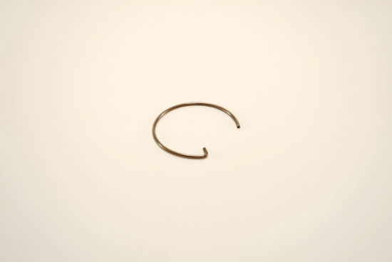 Låsring till lagret i vevaxeln